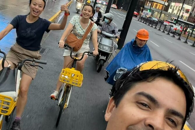 Discover Local Life and Street Food Shanghai Bike Adventure - Worker-focused details you’ll spot from the saddle
