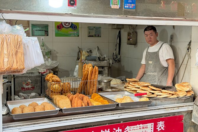 Discover Local Life and Street Food Shanghai Bike Adventure - Street food stops and soft drinks: what to expect (and how to handle it)