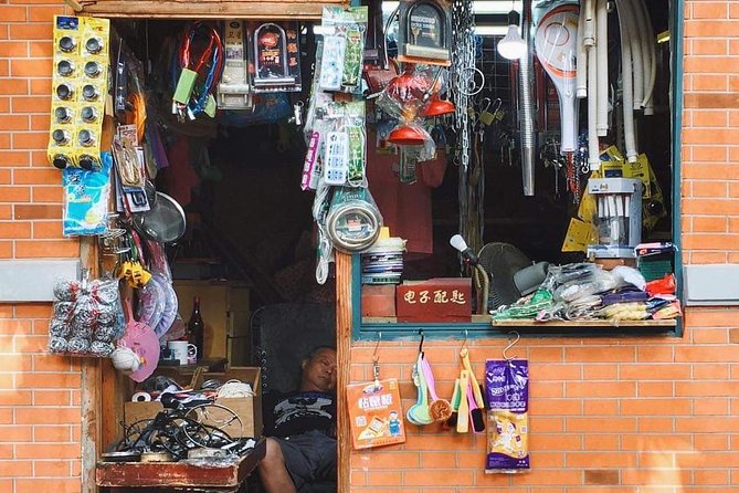 HuangPu River Ferry Boat & Highlights Bike Tour With Local Lunch - Stop 6: Nanjing Lu Through China’s No. 1 Commercial Street