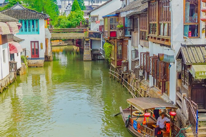 Private Day Tour: Zhujiajiao Water Town with Shanghai Local Shopping Outing - Zhujiajiao: 36 Bridges, Qing-Era Streets, and Riverside Views