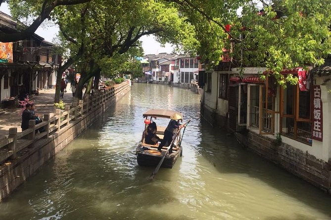 Private Day Trip to Zhujiajiao Water Town w/Flexible Shanghai Highlights - Zhujiajiao Water Town: canals, stone bridges, and the Fangsheng moment
