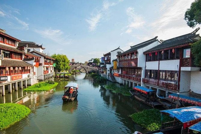 Private Qibao Ancient Town Walking Tour with Tea Tasting and Calligraphy Experience - Walking Qibao’s Old Alleys and Riverside Architecture