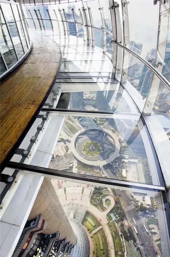 Shanghai Jinmao Tower 88th floor sightseeing hall - Marble, Light, and the Hotel Atrium Scene From Above