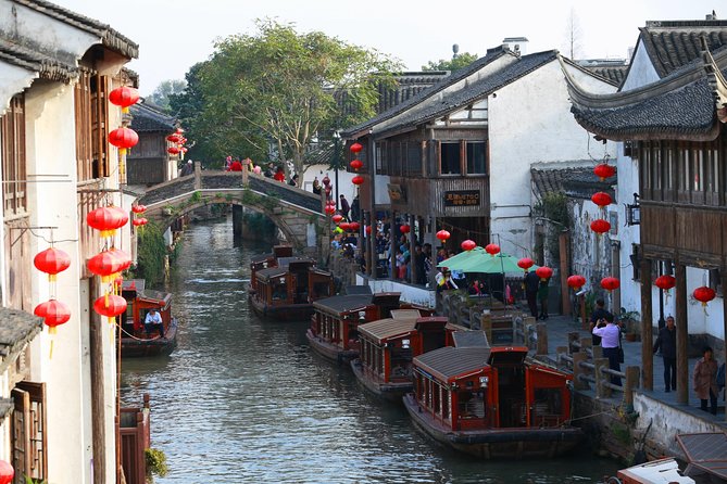 Zhujiajiao Private Day Tour and Shanghai Acrobatic Show - Key highlights to know before you go