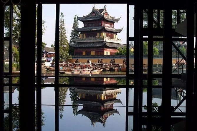 Zhujiajiao Water Town and Shanghai City Highlights Private Day Tour - Zhujiajiao Ancient Town: Streets, Canals, and Your Included Boat Ride