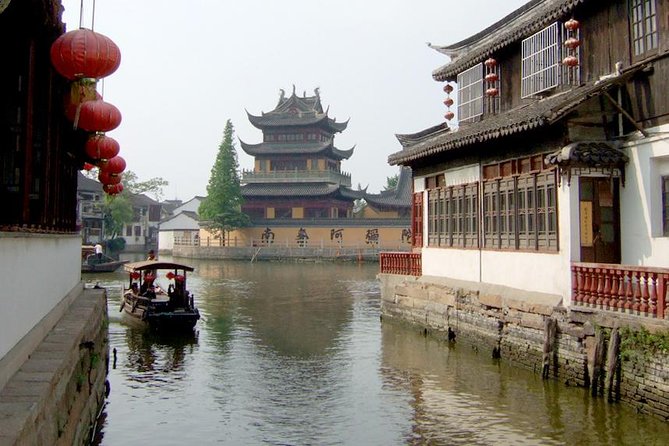 Zhujiajiao Water Village & Seven Treasure Town Day Tour from Shanghai - Zhujiajiao Ancient Town: Bridges, Courtyards, Temples, and Canal Life